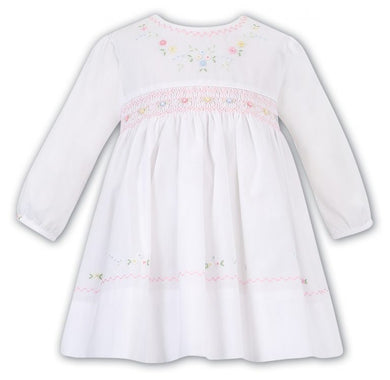 Girls Long Sleeved Traditional Hand Smocked Dress with Embroidered and Applique Detail to Front, Hemline, Sleeves and Round Neckline