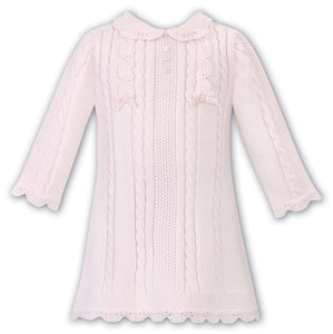 Girls Traditional Knitted Dress. Cable Detail with Applique Bows, Scallop Detail on Hemline and Peter Pan Collar