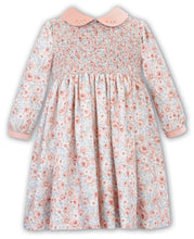 Girls Traditional Hand Smocked and Embroidered Floral Print Long Sleeved Dress with Contasting Peter Pan Collar