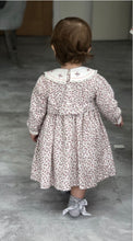 Girls Floral Long Sleeved Dress Traditional Hand Smocking and Embroidery. Contrasting Trim to Sleeves and Yoke Style Neckline