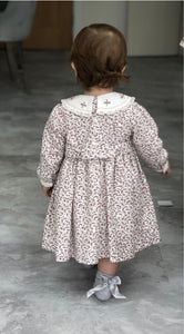 Girls Floral Long Sleeved Dress Traditional Hand Smocking and Embroidery. Contrasting Trim to Sleeves and Yoke Style Neckline