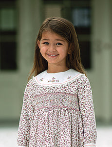 Girls Floral Long Sleeved Dress Traditional Hand Smocking and Embroidery. Contrasting Trim to Sleeves and Yoke Style Neckline