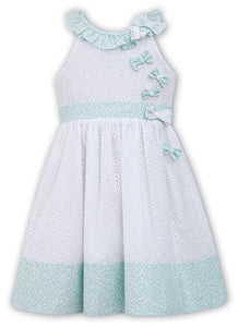 Broderie Anglaise and Delicate Print Sleeveless Dress Beautifully Finished with Contrasting Fabric Bows and Trims