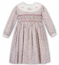 Girls Floral Long Sleeved Dress Traditional Hand Smocking and Embroidery. Contrasting Trim to Sleeves and Yoke Style Neckline