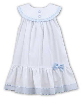 Girls Loose Fitting Sleeveless Dress with Yoke Stitched Detailed Neck, Frilled Hemline with Contrasting Bow and Trim