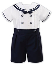 Boys Sailor Style Short Sleeved Shorts Set, Contrasting Trim, Button and Bow and Front Pleated Detail. Button on ShortsNavy/White