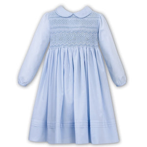 Girls Long Sleeved Traditional Hand Smocked Dress with Embroidered and Applique Detail to Front, Hemline, Sleeves and Peter Pan Collar